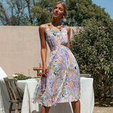Vestido midi con volantes y estampado floral lavanda